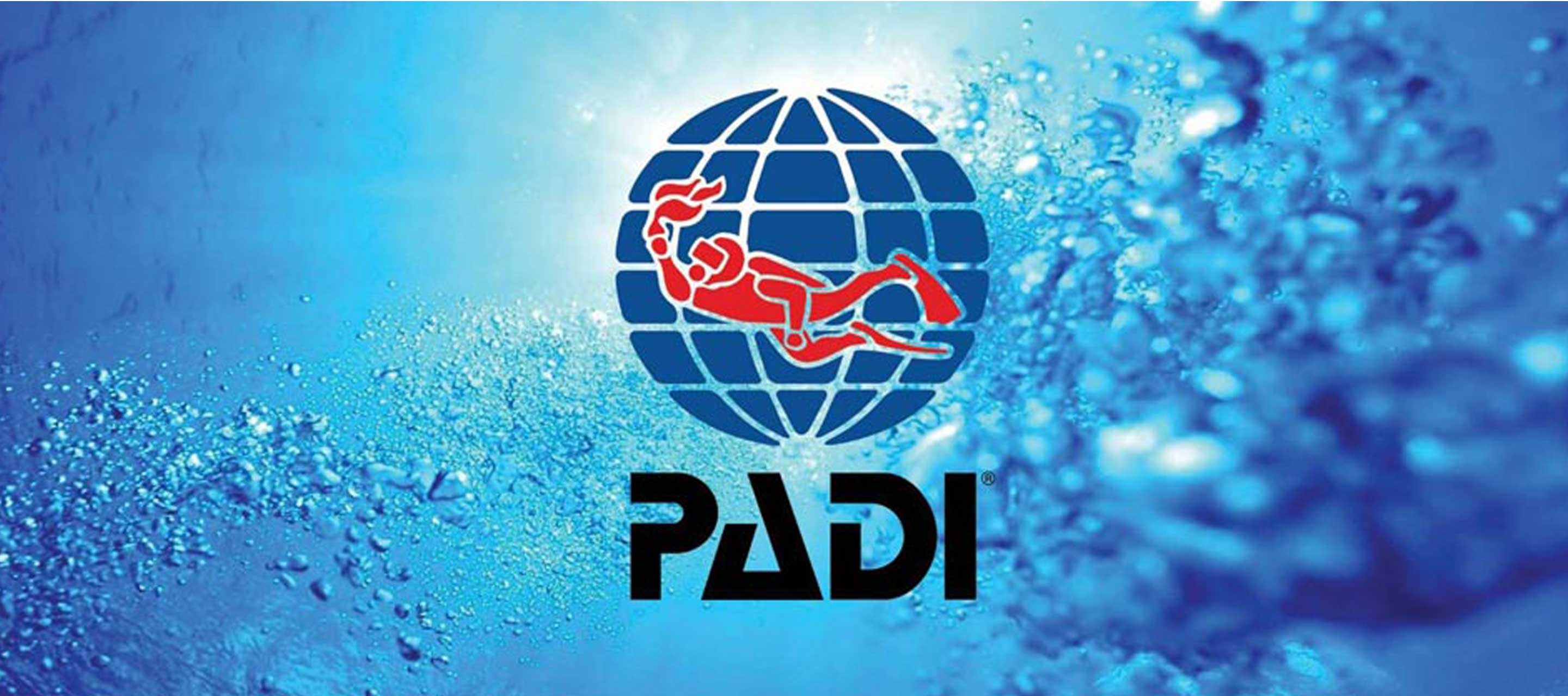 PADI logo with a diver graphic on a blue background with water bubbles
